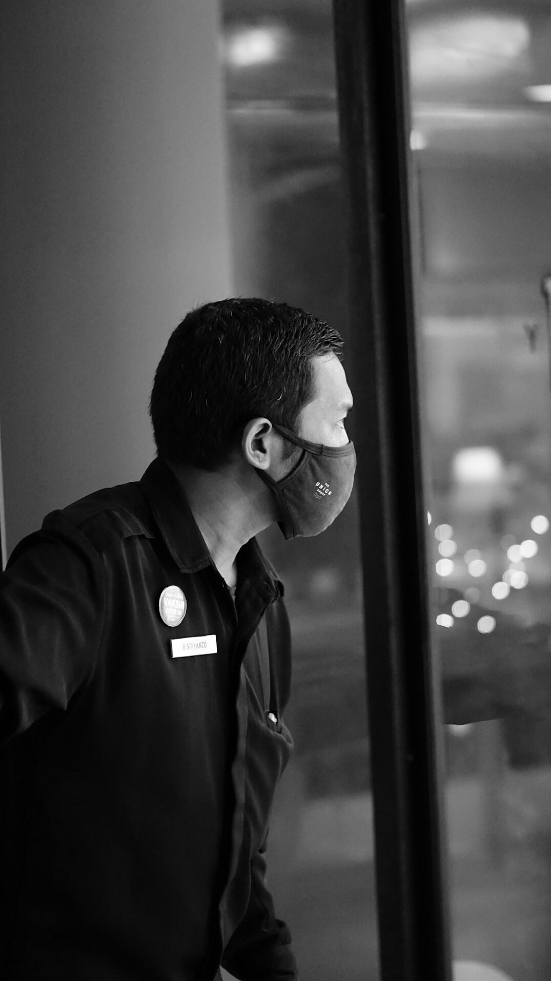 Portrait of a white man sound supervisor in a dark shirt