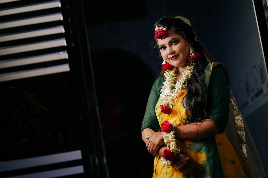 Portrait of a South Asian woman studio director smiling